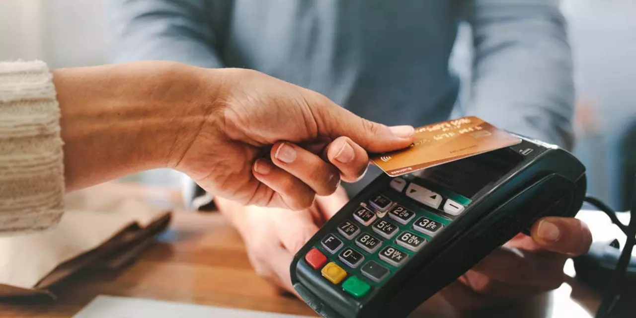 Is it wise to use a debit or a credit card for business purchases?